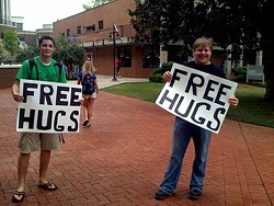 Cops are on the look-out for a man embroiled in a more conniving form of the Free Hugs campaign. - David Cintron via Flickr
