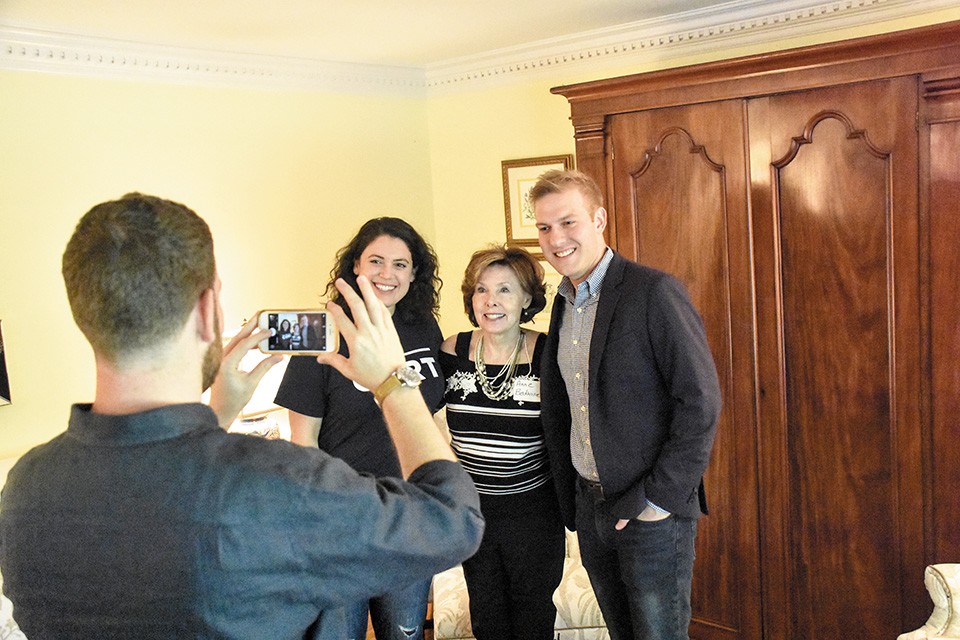 Campaign manager Claire Botnick and VanOstran pose with Democratic booster Anne Bedwinek. Botnick's husband, Aaron Davidowitz takes the photo. - DOYLE MURPHY