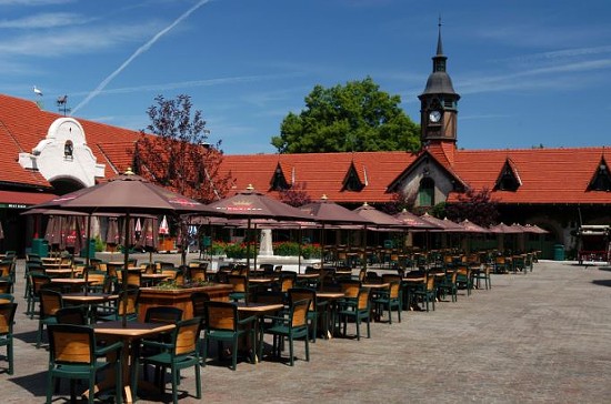 The courtyard outside the Bauernhof, where visitors can indulge their non-naturalistic love of beer. - Grant's Farm