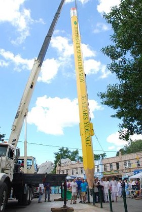 The World's Largest Pencil is about to be joined by the World's Largest Seesaw at the City Museum. - image via
