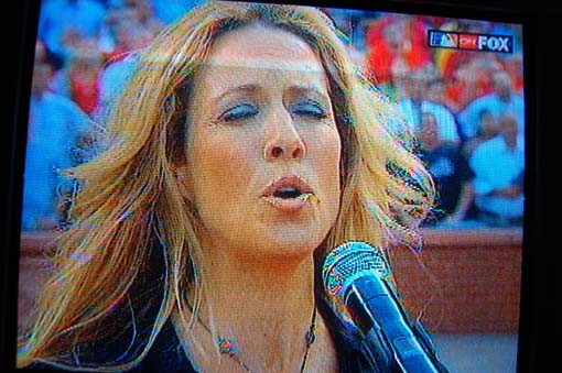 Sheryl Crow sings the national anthem...