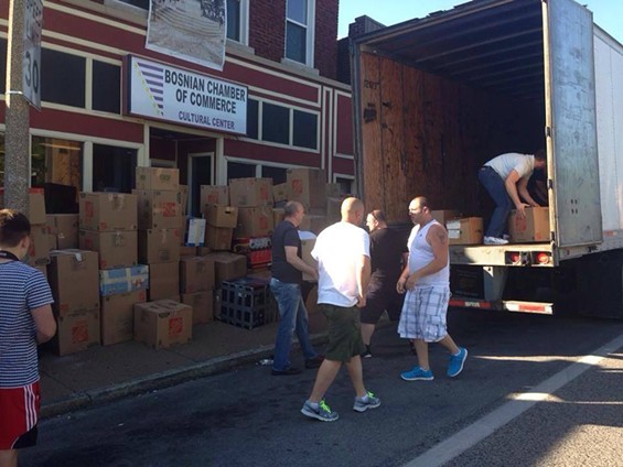 Volunteers gather supplies to ship to Bosnia after devastating floods. - Courtesy of St. Louis Bosnian
