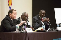 Slay and Reed (far right) tangle at a mayoral debate over Veolia. - Theo R. Welling