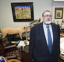 Anzalone posing last year in his cluttered Clayton law office. - Photo: Jennifer Silverberg