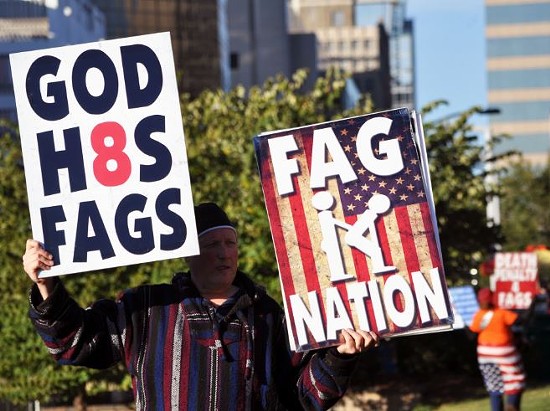 Westboro Baptist Church protesters at the World Series. - Danny Wicentowski