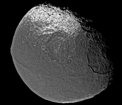 It only looks like the universe's largest walnut, but it's really Iapetus, one of Saturn's many, many moons. - image via