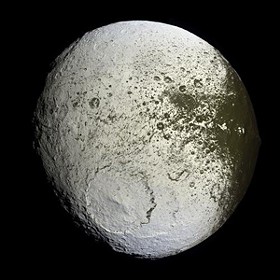 The Dark Side may be attacking Iapetus. Or it could just be bread mold. - image via