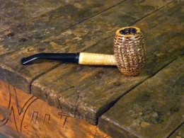 Production of big corncob pipes will be cut in half this year - Image via