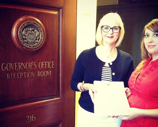 Stacey Newman with the [corrected] constituent services director in the governor's office yesterday. - COURTESY OF NEWMAN