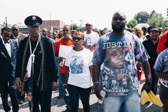 Michael Brown's mother, Lesley McSpadden, center, and father, Michael Brown Sr., right, at a national march in their son's memory. - Bryan Sutter