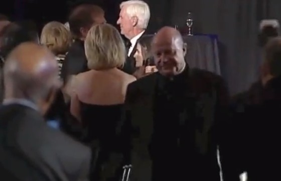 Biondi exiting after his speech. - via YouTube