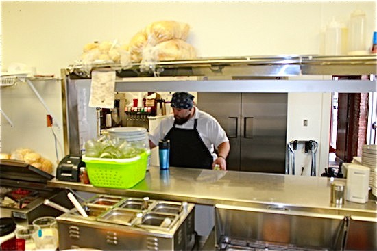 Rick Lewis works in the kitchen of Quincy Street Bistro. - Ian Froeb