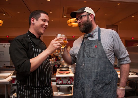 Chefs Brian Coltrain and John Perkins toast with the secret ingredient, Stella Artois, at Iron Fork 2014. | Micah Usher