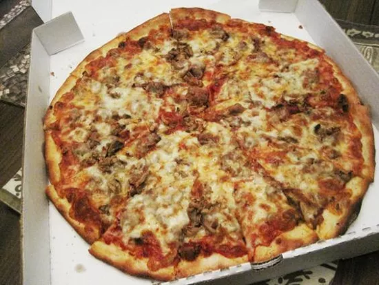 A pizza with sausage and mushrooms from Pizza-a-Go-Go - Ian Froeb