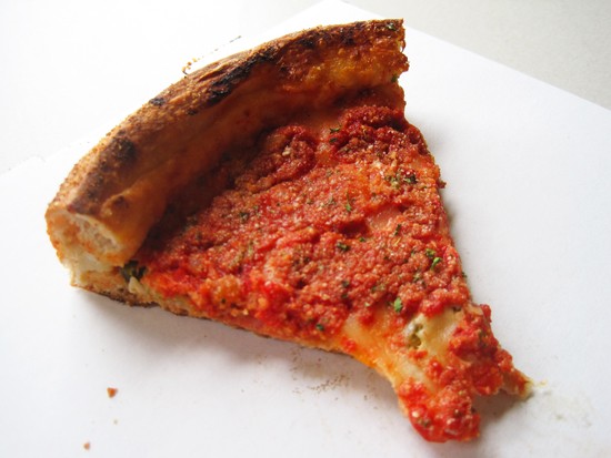 A slice of the deep-dish pizza at Feraro's - Ian Froeb