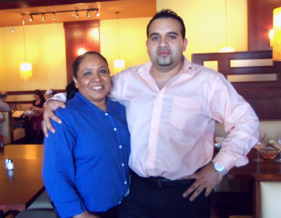 Fiesta co-owner Roger Aguirre and his wife Estella in the restaurant's dining room. - Emily Wasserman