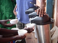 Farmers taking part in a coffee tasting - PHOTO COURTESY SUSTAINABLE HARVEST STAFF