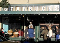 The original Starbucks in Seattle, WA. - User "Postdlf," Wikimedia Commons