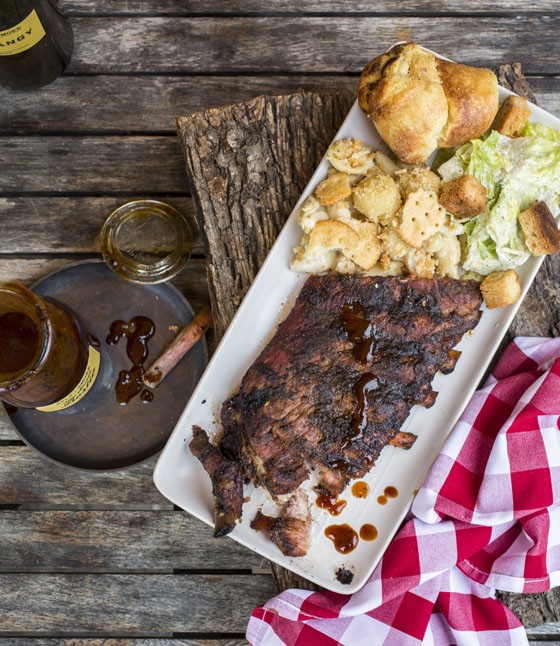 St. Louis Cut Ribs with a side of White Cheddar Cracker Mac and side Caesar salad. | Jennifer Silverberg