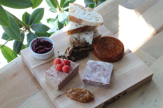 House-made terrine board: (counterclockwise from upper left) pickled beets; chicken-liver p&acirc;t&eacute; with pickled cherries; peach butter; ciccioli; goat and harissa; pickled shiitake mushrooms. | Evan C. Jones
