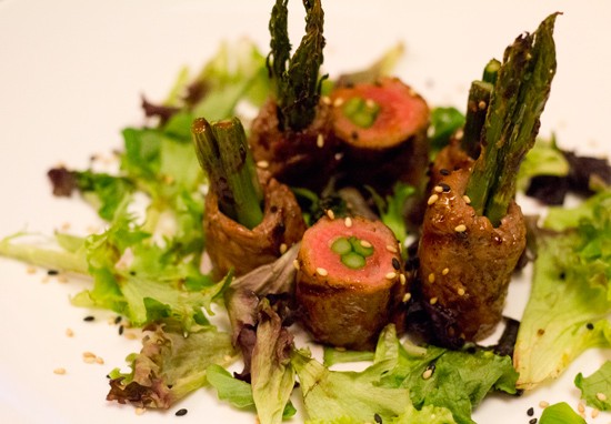 Gyu-Negima: Asparagus rolled in thin slices of premium beef, grilled and infused with a sweet garlic soy