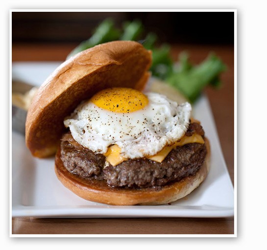 &nbsp;&nbsp;&nbsp;&nbsp;&nbsp;&nbsp;&nbsp;The "Breakfast of Champions" burger from Five Star, with a sunny-side-up egg, American &nbsp;&nbsp;&nbsp;&nbsp;&nbsp;&nbsp;&nbsp;cheese, roast tomato-bacon jam and hollandaise sauce. | Jennifer Silverberg