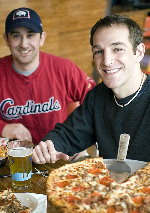 Owners Bill Cipriani (left), a Pittsburgh native and Adrian Glass (right), who grew up in Belleville, met while working at a restaurant in the resort town of Breckenridge, Colorado. One day Adrian gave Bill a call, and said "'I've got this idea for a Fantasy Sports themed Restaurant and bar,' and three years later, the Post was born," Cipriani recalls. See more photos here. - Photo: Jennifer Silverberg