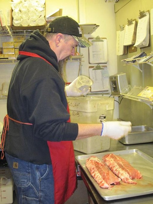 Mike Emerson, co-owner of Pappy's Smokehouse, hard at work - Robin Wheeler