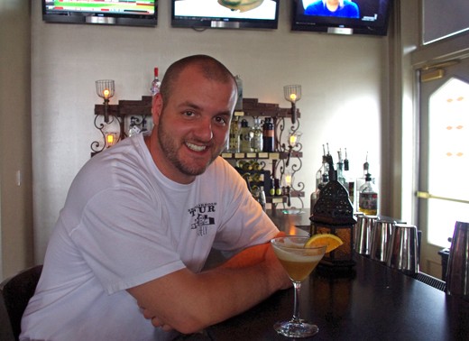 Sanctuaria bar manager Matt Seiter serves cocktails from his book tonight at Taste. - Alissa Nelson