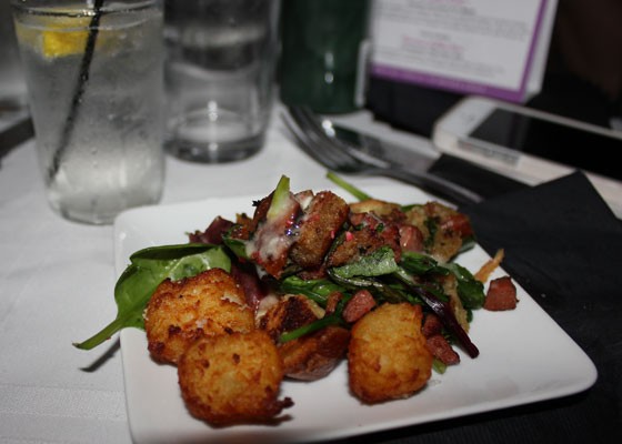 "Gretchen Weiners Had Cracked": housemade tater tots with Hebrew National all-beef wiener (get it?), buttered and grilled challah, fresh arugula and baby kale, tomato, cracked pink peppercorn and housemade Caesar dressing.  | Nancy Stiles