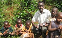 Coffee farmer Sam Kauka with his children. - Courtesy Crop to Cup