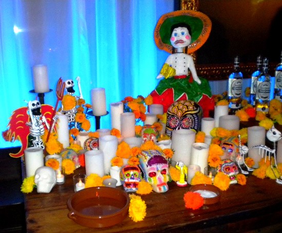 Festive decor at the Day of the Dead party. - Deborah Hyland
