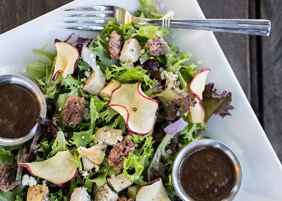 The "Apple Orchard" salad brings garden greens and arcadian lettuce dressed with roasted chicken, red onions, apple chips, gorgonzola cheese, sweet pecans and balsamic vinaigrette.. | Jennifer Silverberg