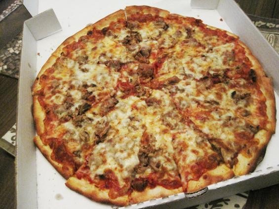 Pizza with pepperoni, sausage and mushroom at Pizza-a-Go-Go - Ian Froeb