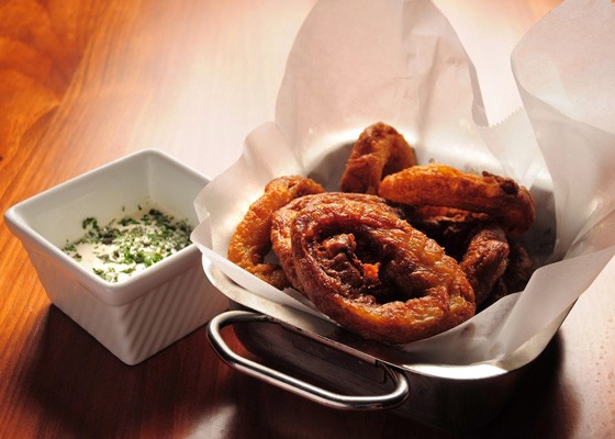 Buttermilk onion rings with buttermilk ranch and sweet hot barbecue sauce. | David Lancaster