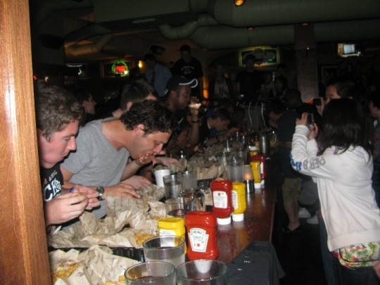 Last year's tater tot eaters chow down. - courtesy of Bar Louie