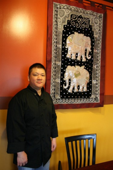 Scott Truong (pictured) and his brother, Tommy, decorated Pearl Cafe, down to every last detail. - Chrissy Wilmes