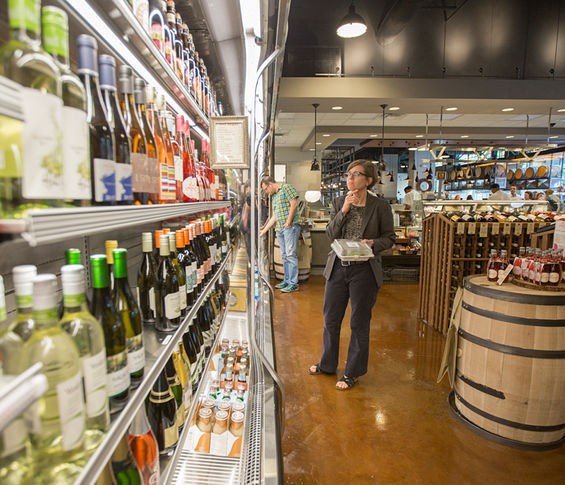 Wine in the beverage cooler at Central Table Food Hall. - Jennifer Silverberg