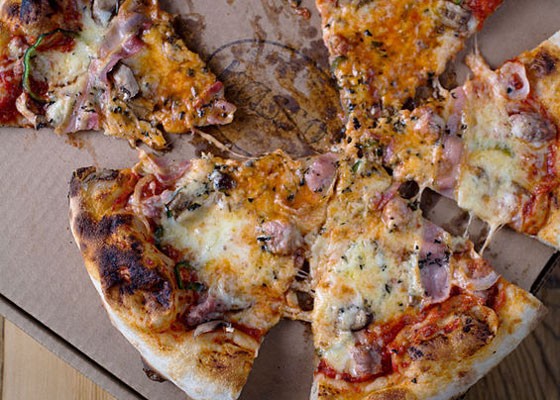 Provel-covered pizza at Basso. | Jennifer Silverberg