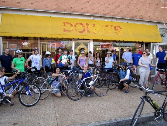 Tour D'Onut bikers line up in front of John Donut before moseying to the second shop. - Amanda Woytus