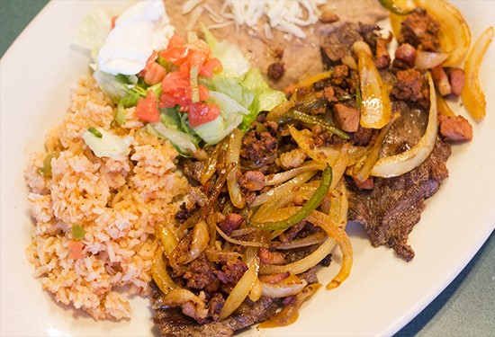 "Steak Ranchero" with onions, chorizo, bacon, rice and beans.