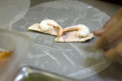 Start with shrimp on the rice paper -- and don't forget the pork.