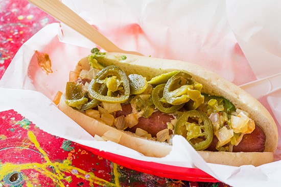 The "Aye Chihuahua" with a quarter-pound chorizo, cilantro, chipotle onions, relish, spicy brown mustard, jalapeno and avocado. - Photos by Mabel Suen