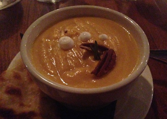 Butternut squash soup with toasted pecans and sour cream. | Nancy Stiles
