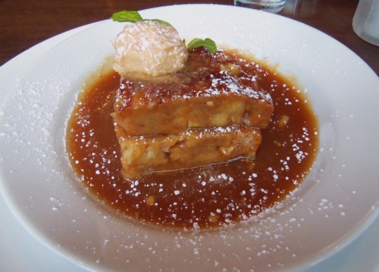 "Remy's Warm Apple and Golden Raisin Bread Pudding" with brandy sauce. - Emily Wasserman