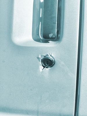 The lock on the Districts' van was punched in, and hundreds of dollars worth of gear was stolen. - thedistrictsband.com