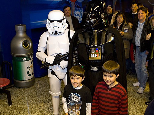 A Stormtrooper from the 501st and Darth Vader himself were making there way through the crowd and posing for pictures with young fans. See more photos from last night. - Photo: Stew Smith