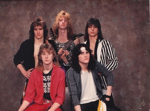 Obviously, the dude in the middle, wearing the sleeveless leopard print shirt, is too cool for this band. - Scott Russell