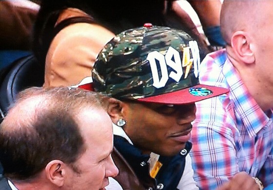 Nelly, at a Timberwolves game - Theron Thompson