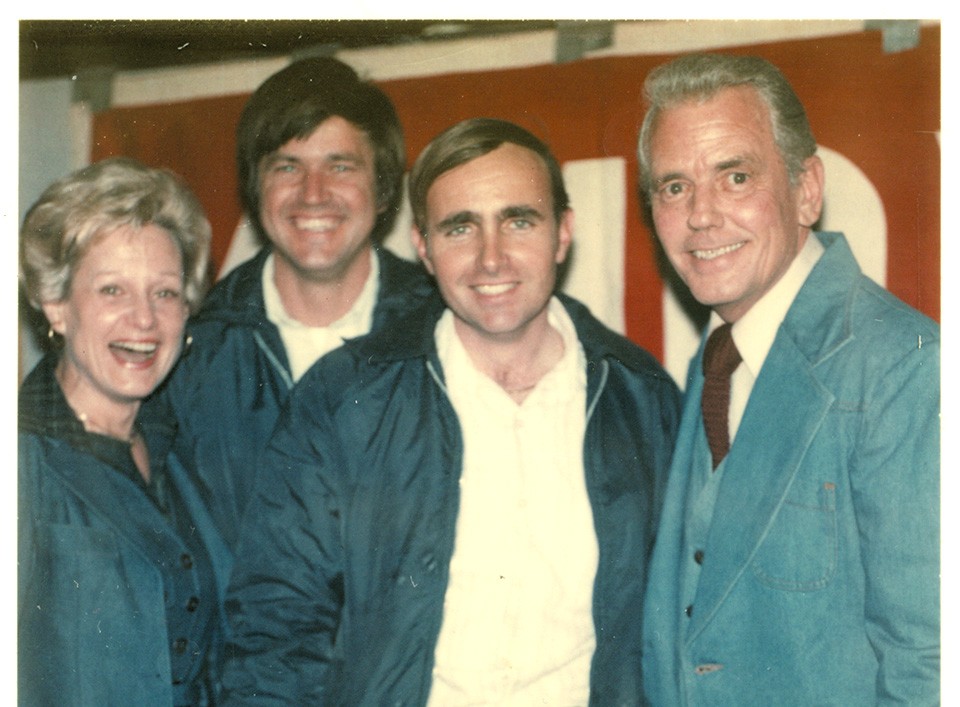 Barklage (second from left) and childhood friend Gene Hoffmeyer (second from right), with traffic reporters Don Miller and Sue Mathias, both became pilots. - COURTESY OF GENE HOFFMEYER